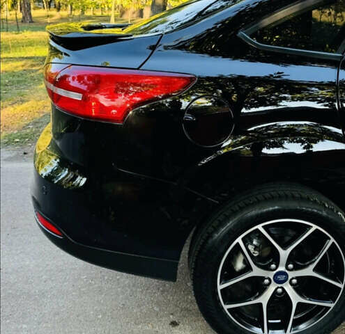 Черный Форд Фокус, объемом двигателя 2 л и пробегом 97 тыс. км за 8300 $, фото 2 на Automoto.ua