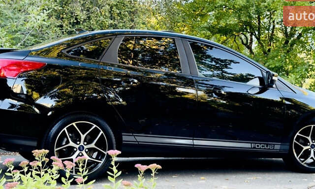 Черный Форд Фокус, объемом двигателя 2 л и пробегом 97 тыс. км за 8300 $, фото 7 на Automoto.ua