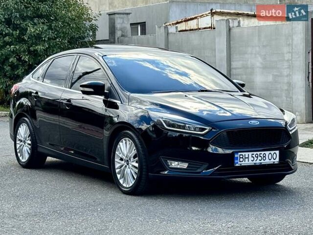 Черный Форд Фокус, объемом двигателя 2.01 л и пробегом 145 тыс. км за 9900 $, фото 2 на Automoto.ua