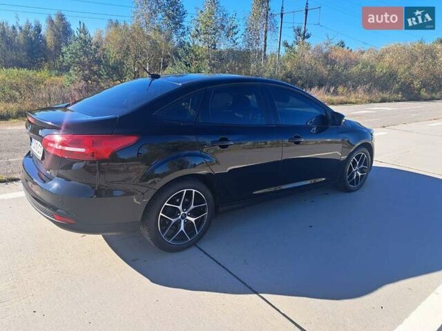 Чорний Форд Фокус, об'ємом двигуна 2 л та пробігом 95 тис. км за 9480 $, фото 9 на Automoto.ua