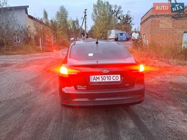 Чорний Форд Фокус, об'ємом двигуна 2 л та пробігом 95 тис. км за 9480 $, фото 20 на Automoto.ua