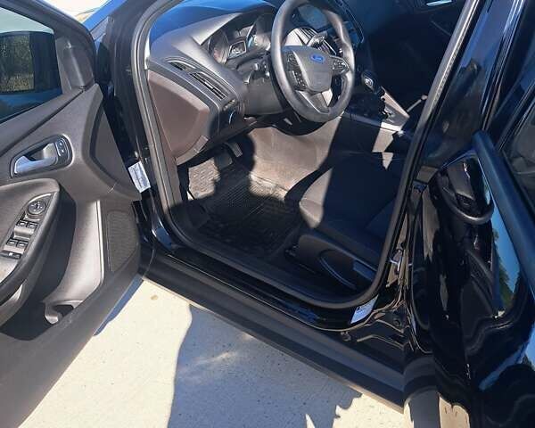 Чорний Форд Фокус, об'ємом двигуна 2 л та пробігом 95 тис. км за 9480 $, фото 8 на Automoto.ua