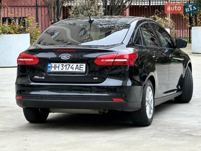 Черный Форд Фокус, объемом двигателя 2 л и пробегом 98 тыс. км за 9600 $, фото 6 на Automoto.ua