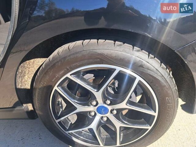 Чорний Форд Фокус, об'ємом двигуна 2 л та пробігом 95 тис. км за 9480 $, фото 3 на Automoto.ua