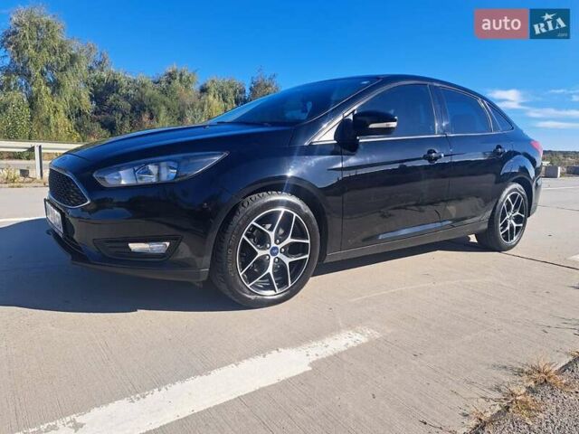 Черный Форд Фокус, объемом двигателя 2 л и пробегом 94 тыс. км за 9750 $, фото 8 на Automoto.ua