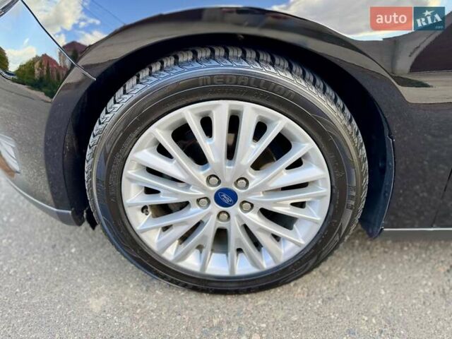 Черный Форд Фокус, объемом двигателя 2.01 л и пробегом 145 тыс. км за 9900 $, фото 21 на Automoto.ua