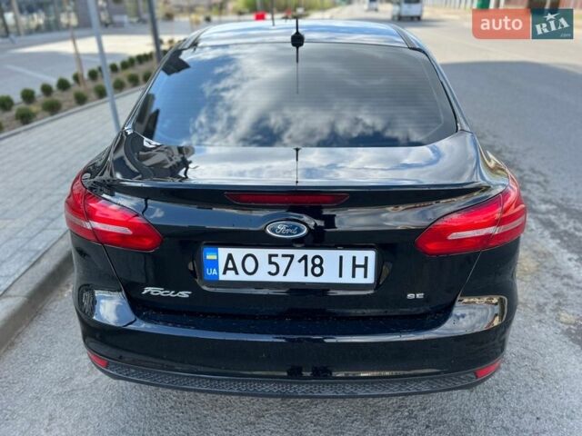 Чорний Форд Фокус, об'ємом двигуна 2 л та пробігом 94 тис. км за 6999 $, фото 10 на Automoto.ua