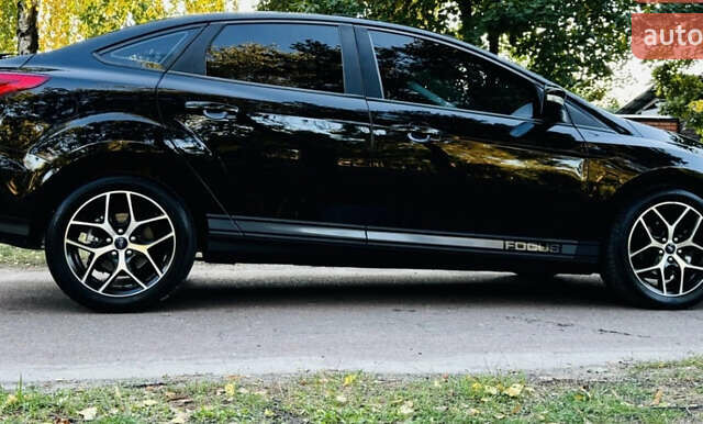 Черный Форд Фокус, объемом двигателя 2 л и пробегом 97 тыс. км за 8300 $, фото 1 на Automoto.ua