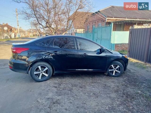 Чорний Форд Фокус, об'ємом двигуна 2 л та пробігом 49 тис. км за 9700 $, фото 1 на Automoto.ua