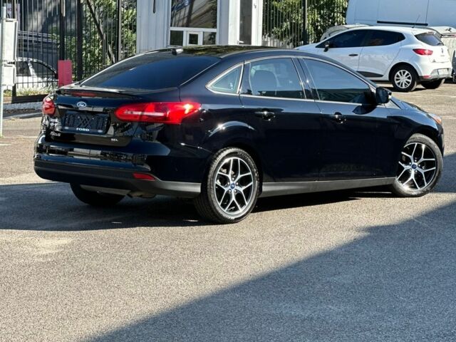 Чорний Форд Фокус, об'ємом двигуна 2 л та пробігом 165 тис. км за 9300 $, фото 1 на Automoto.ua