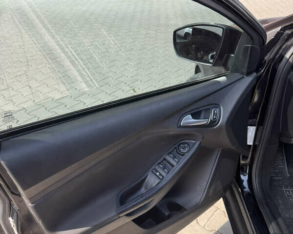 Чорний Форд Фокус, об'ємом двигуна 2 л та пробігом 199 тис. км за 8150 $, фото 9 на Automoto.ua