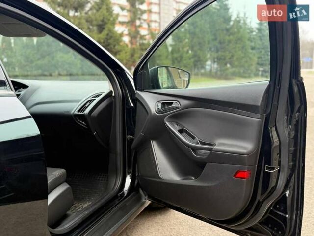 Чорний Форд Фокус, об'ємом двигуна 2 л та пробігом 99 тис. км за 8000 $, фото 23 на Automoto.ua