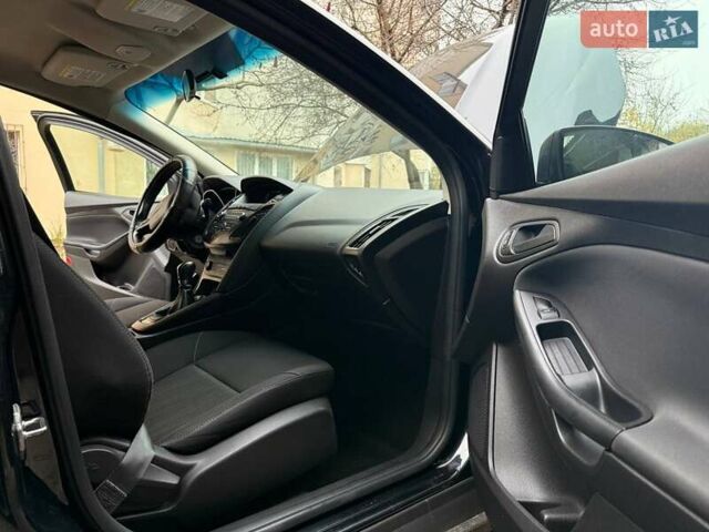 Чорний Форд Фокус, об'ємом двигуна 2 л та пробігом 99 тис. км за 8000 $, фото 13 на Automoto.ua