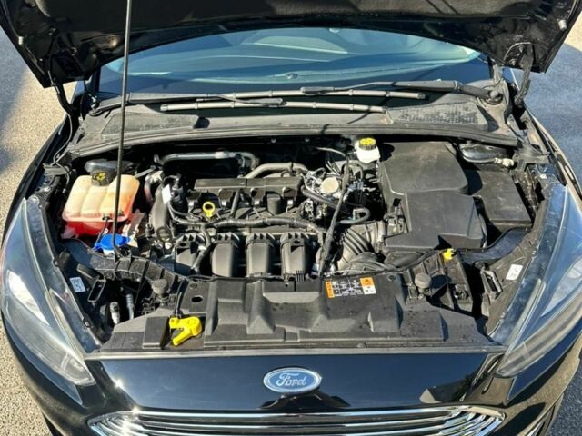 Чорний Форд Фокус, об'ємом двигуна 2 л та пробігом 165 тис. км за 9300 $, фото 5 на Automoto.ua