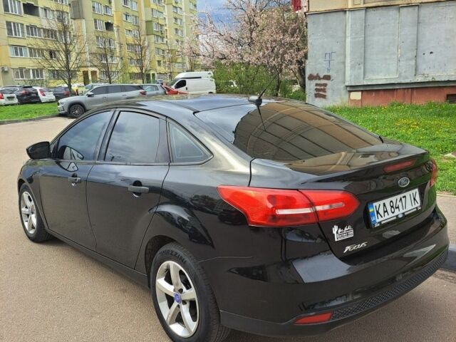 Чорний Форд Фокус, об'ємом двигуна 2 л та пробігом 230 тис. км за 8827 $, фото 4 на Automoto.ua