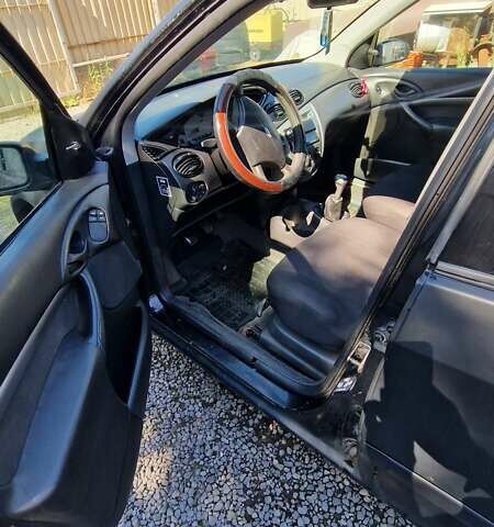 Черный Форд Фокус, объемом двигателя 1.6 л и пробегом 500 тыс. км за 2300 $, фото 4 на Automoto.ua