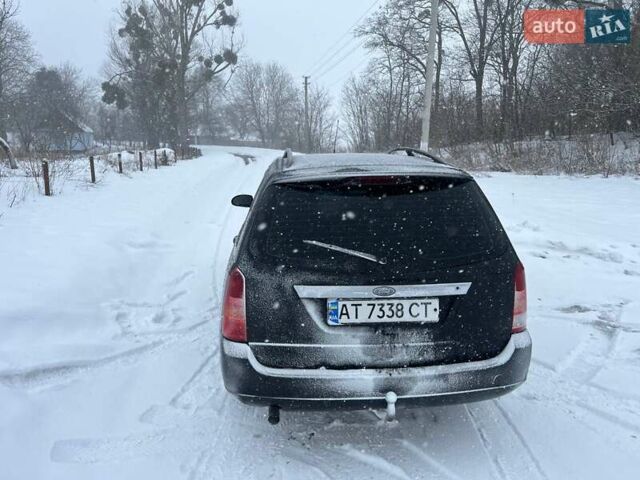 Черный Форд Фокус, объемом двигателя 1.8 л и пробегом 222 тыс. км за 2000 $, фото 3 на Automoto.ua