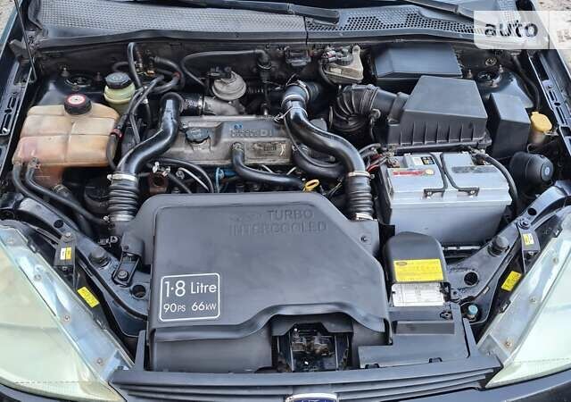 Черный Форд Фокус, объемом двигателя 1.8 л и пробегом 345 тыс. км за 2500 $, фото 4 на Automoto.ua