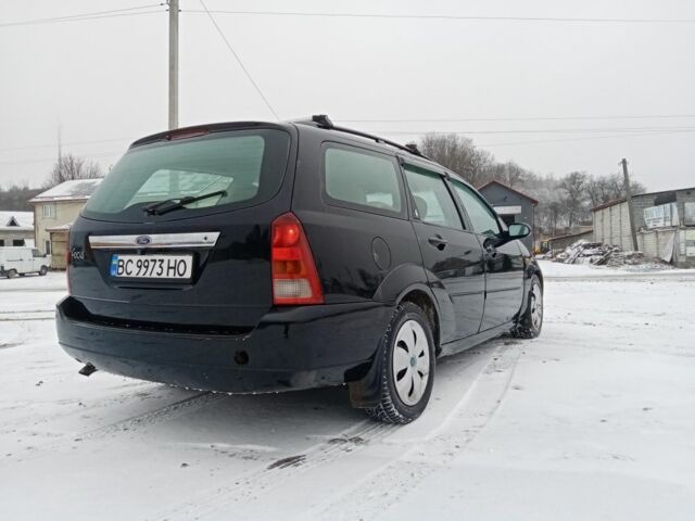 Черный Форд Фокус, объемом двигателя 1.8 л и пробегом 398 тыс. км за 2150 $, фото 3 на Automoto.ua