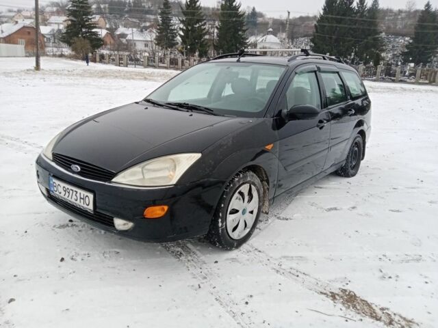 Черный Форд Фокус, объемом двигателя 1.8 л и пробегом 398 тыс. км за 2150 $, фото 1 на Automoto.ua