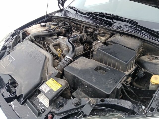 Черный Форд Фокус, объемом двигателя 1.8 л и пробегом 398 тыс. км за 2150 $, фото 6 на Automoto.ua