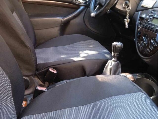 Черный Форд Фокус, объемом двигателя 1.8 л и пробегом 420 тыс. км за 3100 $, фото 3 на Automoto.ua