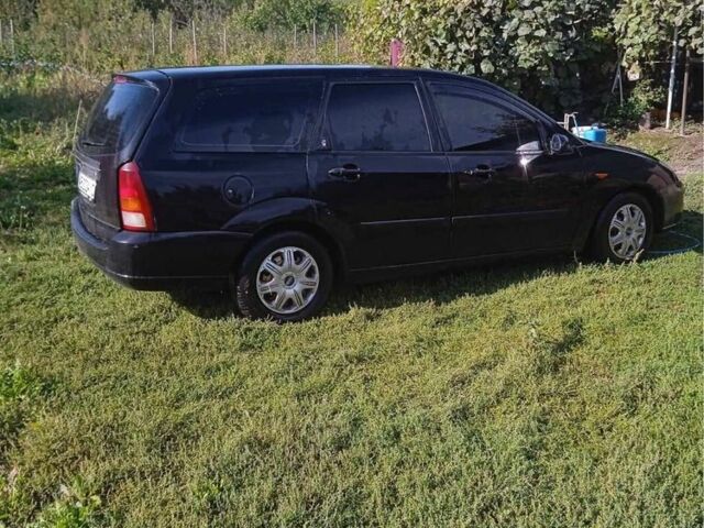 Черный Форд Фокус, объемом двигателя 1.8 л и пробегом 420 тыс. км за 3100 $, фото 4 на Automoto.ua