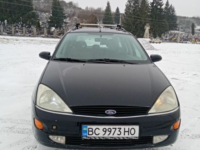 Черный Форд Фокус, объемом двигателя 1.8 л и пробегом 398 тыс. км за 2150 $, фото 2 на Automoto.ua