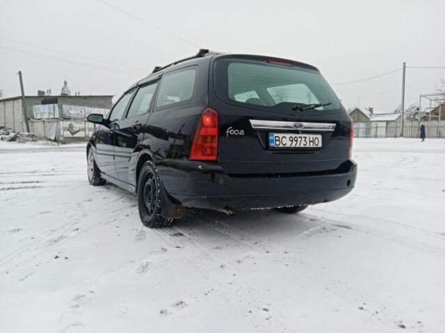 Черный Форд Фокус, объемом двигателя 1.8 л и пробегом 398 тыс. км за 2150 $, фото 4 на Automoto.ua