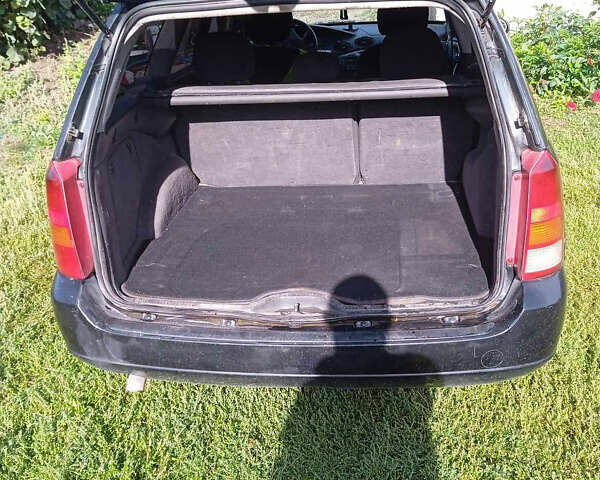 Черный Форд Фокус, объемом двигателя 1.8 л и пробегом 420 тыс. км за 3100 $, фото 5 на Automoto.ua