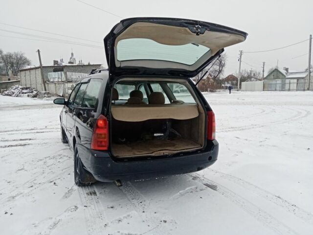 Черный Форд Фокус, объемом двигателя 1.8 л и пробегом 398 тыс. км за 2150 $, фото 5 на Automoto.ua