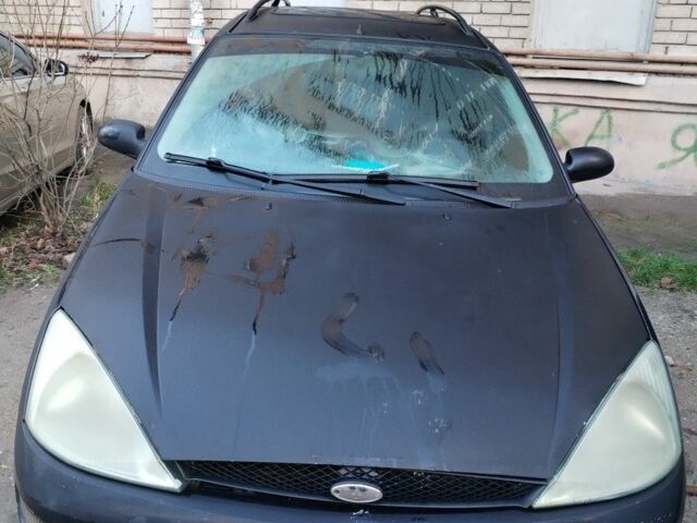 Черный Форд Фокус, объемом двигателя 1.8 л и пробегом 420 тыс. км за 1400 $, фото 10 на Automoto.ua