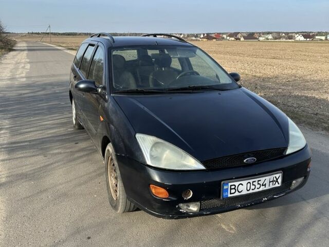 Черный Форд Фокус, объемом двигателя 1.8 л и пробегом 330 тыс. км за 1000 $, фото 1 на Automoto.ua