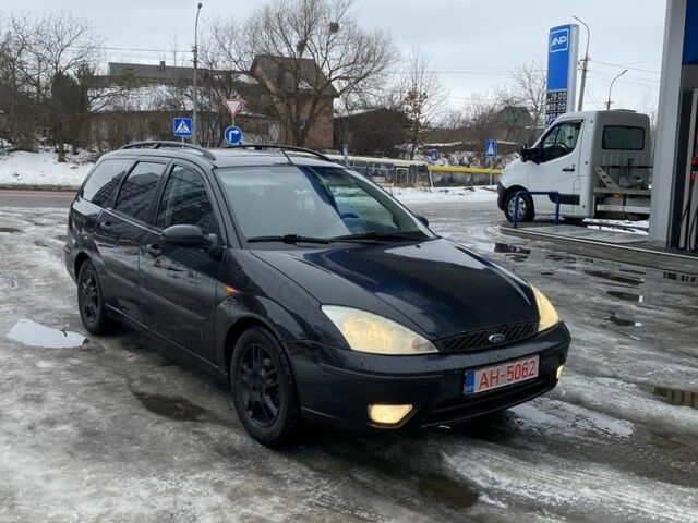 Черный Форд Фокус, объемом двигателя 1.8 л и пробегом 280 тыс. км за 2000 $, фото 2 на Automoto.ua