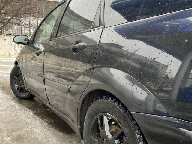 Черный Форд Фокус, объемом двигателя 1.8 л и пробегом 280 тыс. км за 2000 $, фото 6 на Automoto.ua