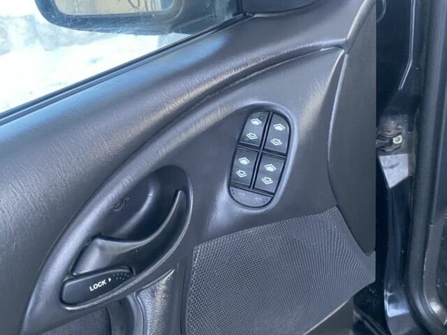 Черный Форд Фокус, объемом двигателя 1.8 л и пробегом 280 тыс. км за 2000 $, фото 14 на Automoto.ua