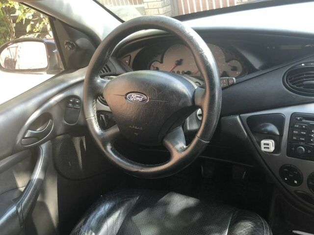 Черный Форд Фокус, объемом двигателя 1.8 л и пробегом 460 тыс. км за 3400 $, фото 7 на Automoto.ua