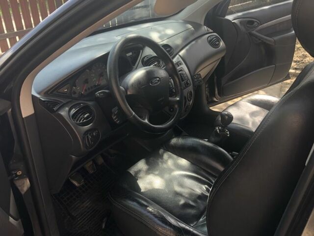 Черный Форд Фокус, объемом двигателя 1.8 л и пробегом 460 тыс. км за 3400 $, фото 5 на Automoto.ua