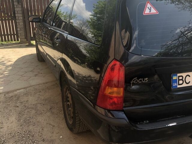 Черный Форд Фокус, объемом двигателя 1.8 л и пробегом 460 тыс. км за 3400 $, фото 4 на Automoto.ua