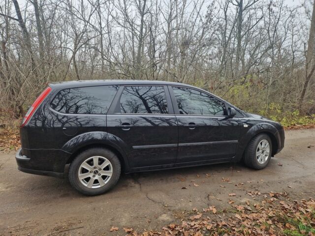 Черный Форд Фокус, объемом двигателя 1.6 л и пробегом 289 тыс. км за 4400 $, фото 5 на Automoto.ua