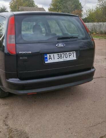 Черный Форд Фокус, объемом двигателя 1.6 л и пробегом 286 тыс. км за 4550 $, фото 3 на Automoto.ua