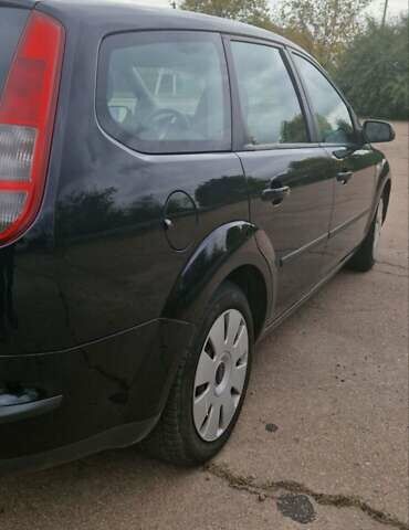 Черный Форд Фокус, объемом двигателя 1.6 л и пробегом 286 тыс. км за 4550 $, фото 2 на Automoto.ua