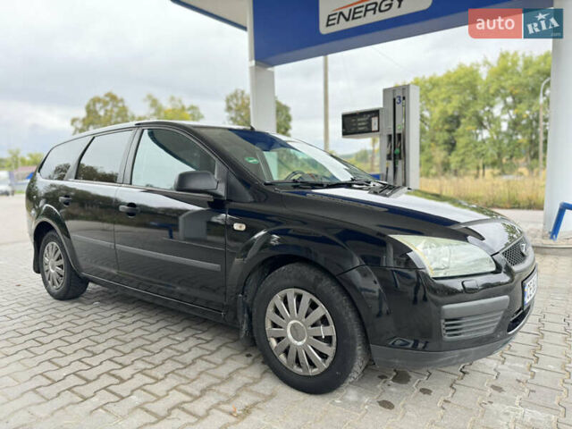 Черный Форд Фокус, объемом двигателя 1.6 л и пробегом 260 тыс. км за 3950 $, фото 6 на Automoto.ua