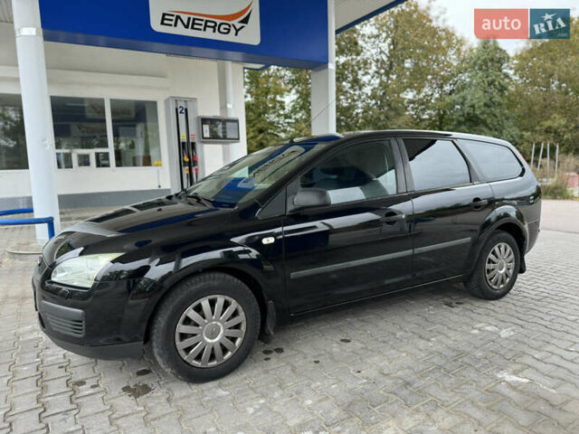 Черный Форд Фокус, объемом двигателя 1.6 л и пробегом 260 тыс. км за 3950 $, фото 2 на Automoto.ua