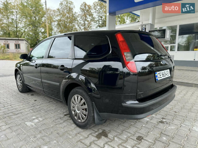 Черный Форд Фокус, объемом двигателя 1.6 л и пробегом 260 тыс. км за 3950 $, фото 4 на Automoto.ua