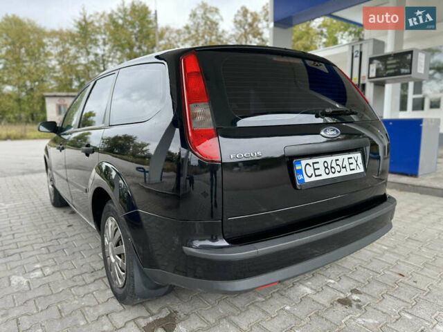 Черный Форд Фокус, объемом двигателя 1.6 л и пробегом 260 тыс. км за 3950 $, фото 5 на Automoto.ua