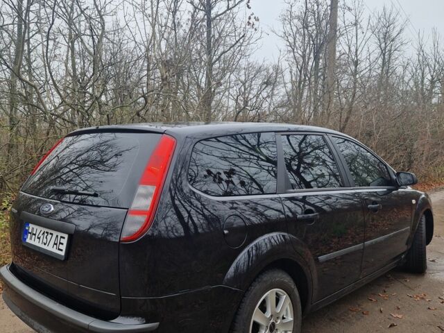 Черный Форд Фокус, объемом двигателя 1.6 л и пробегом 289 тыс. км за 4400 $, фото 7 на Automoto.ua