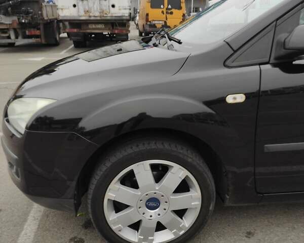 Черный Форд Фокус, объемом двигателя 1.6 л и пробегом 312 тыс. км за 4800 $, фото 7 на Automoto.ua