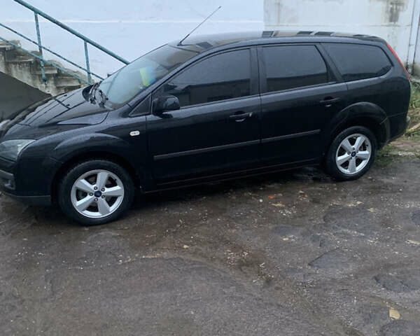 Черный Форд Фокус, объемом двигателя 1.6 л и пробегом 240 тыс. км за 5300 $, фото 2 на Automoto.ua