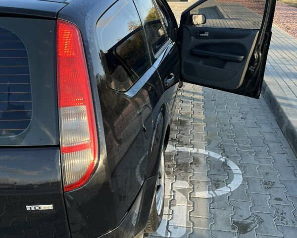 Черный Форд Фокус, объемом двигателя 1.56 л и пробегом 305 тыс. км за 4200 $, фото 5 на Automoto.ua